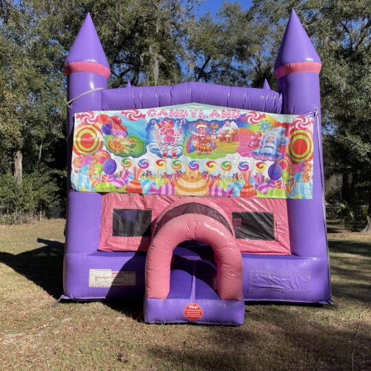 Purple candy-themed inflatable bounce house