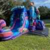 The "Mermaid Bounce House and Slide" is perfect for any under-the-sea themed party or event.