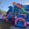 The Mermaid Bounce House and Slide is a delightful inflatable play structure inspired by the enchanting underwater world of mermaids.
