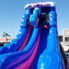 A blue and pink Mermaid Slide in a parking lot.
Product Name: Unicorn Slide