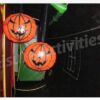 A Halloween Haunted Maze inflatable bouncer with pumpkins hanging from the ceiling.