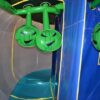 A Halloween Haunted Maze with green and blue balloons.