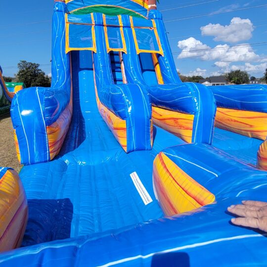 An 18 Foot Double Splash Slide at an outdoor event.