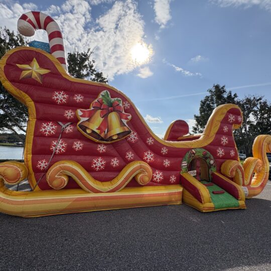 inflatable Christmas sleigh bounce house outdoors